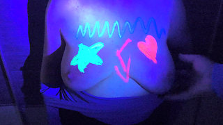Her tits glowing in the dark