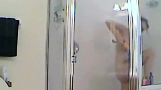 MILF stepmother spied in the shower