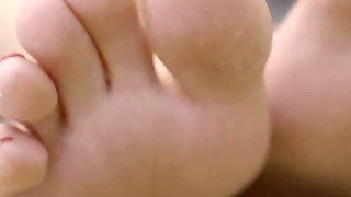 Blonde MILF Teases with Her Perfect Feet