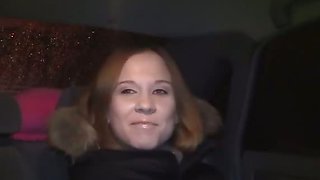 Sexy redhead fucked in a car