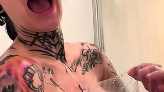 Hot babe with perfect big boobs taking shower