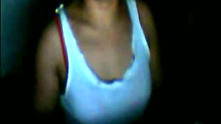 Bored Filipina cam whore flashes me her tits and pussy