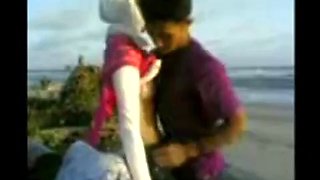 Indonesian- hijab girl fucks on the beach