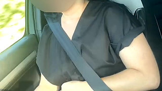 Naked sexy MILF in a car