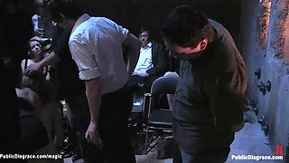 Strapped slave group caned in public
