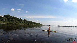 Blonde Solo Girl Naked on a SUP Board