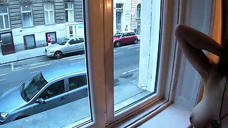 Sex at the window in front of strangers
