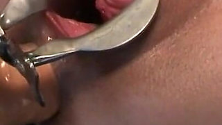 Humiliates stretches her pussy