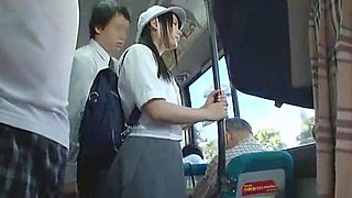 A man targets a girl in a uniform, groping her body and lifting her skirt to touch her buttocks.