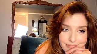 Stunning redhead milf takes herself to orgasm on the webcam