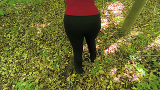 Spanking her naked ass in the woods