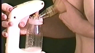 Hot girl squeezes her big nipples to squirt out milk