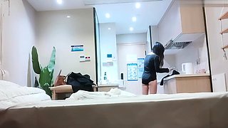 Cute amateur asian web cam girl playing with her toy