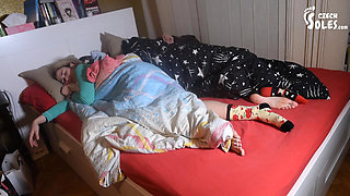 Two Footsie Girls in Bed