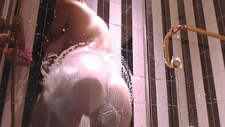 Busty Latin Babe Oils Her Big Boobs And Booty