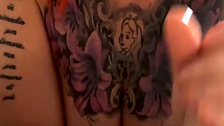 Tattooed Redhead Footjob Fun