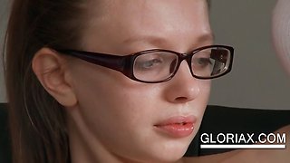 Teen with glasses shows pussy