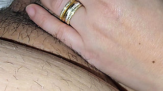 Slutty step mom pulled step son dick out for a handjob in bed