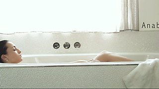 Lovely teen brunette dildos her cunt in the shower