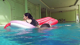 Kittina Ivory undresses in the swimming pool