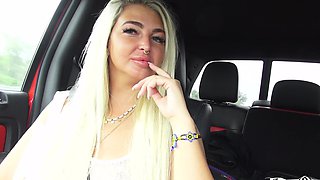 Blonde Kitty enjoys while giving a blowjob in the back of a car