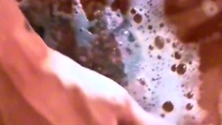 Draining and showcasing her immense love button.