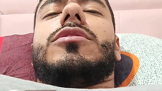 Man Masturbating in His Bed