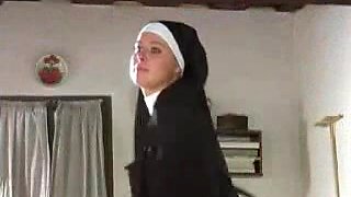 Slave girl is tied up and whipped by a sexy nun
