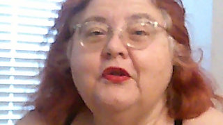 Mature BBW Redhead Nurse Vicki Talks to You as She Makes a Lipstick Applying Video for You!